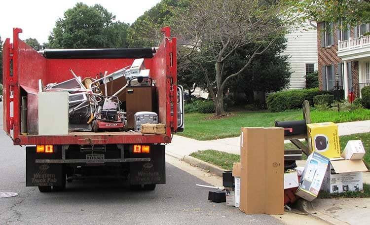 Truck with junk in the trunk and off street